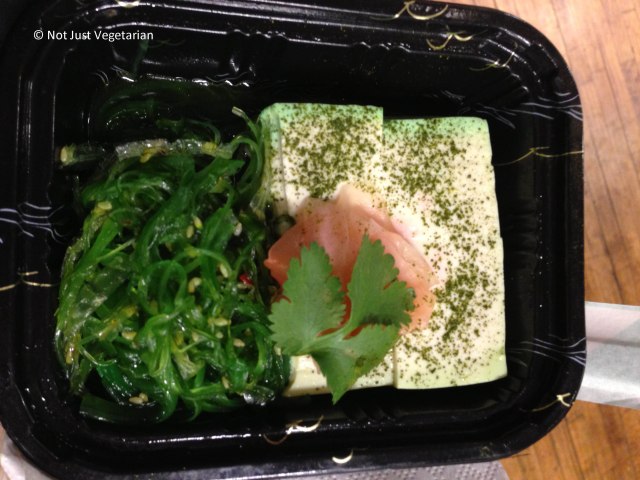 Tofu with seaweed salad served at the Bird Pick table at The Seed 2013 in NYC