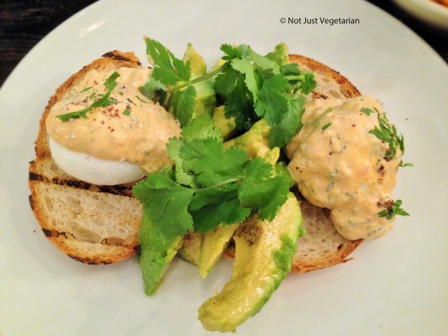 Turkish style poached eggs with yoghurt, chilli, and avocado at Apero in London